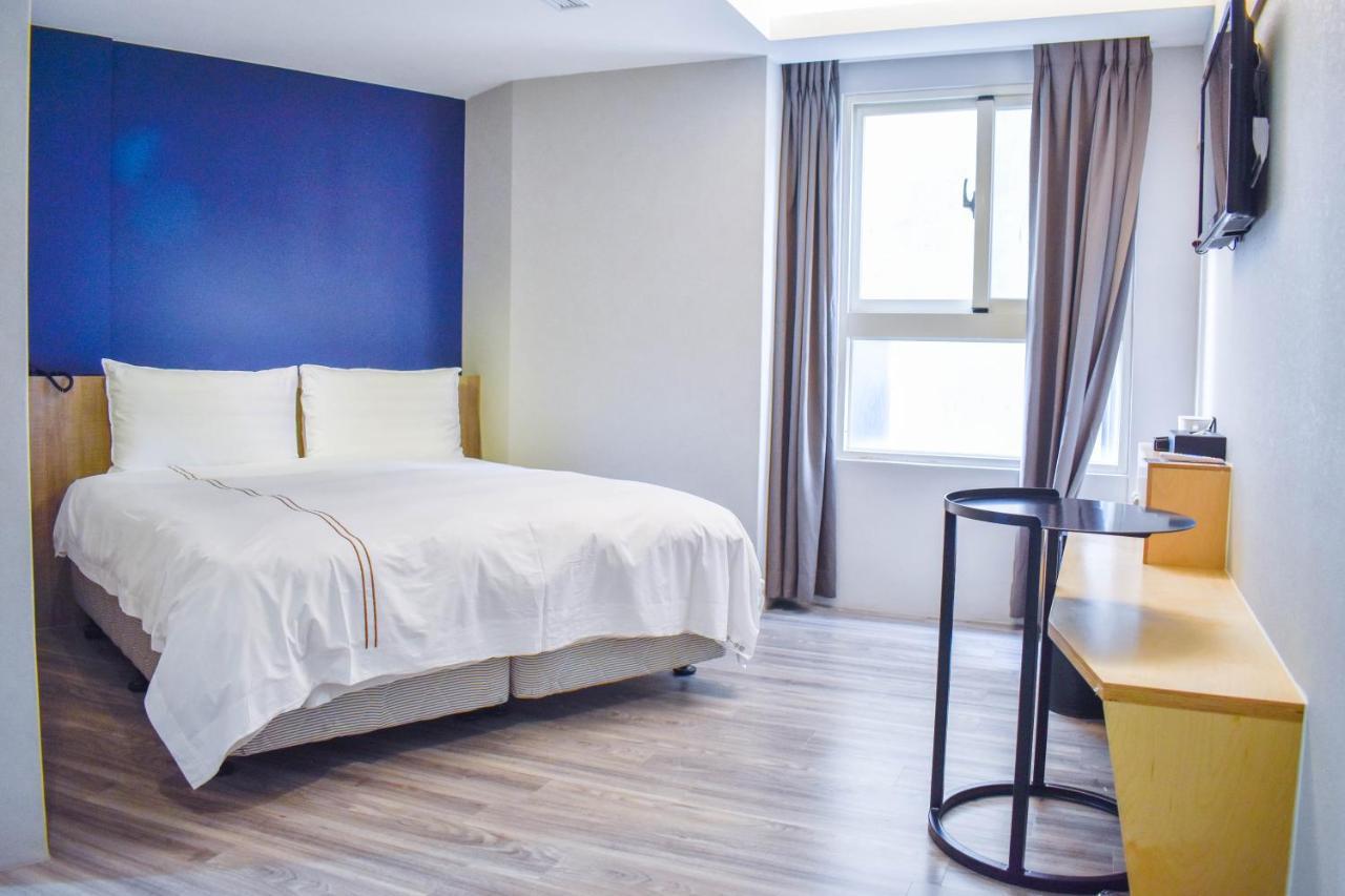 Talmud Business Hotel - Zhongshan ไถจง ภายนอก รูปภาพ