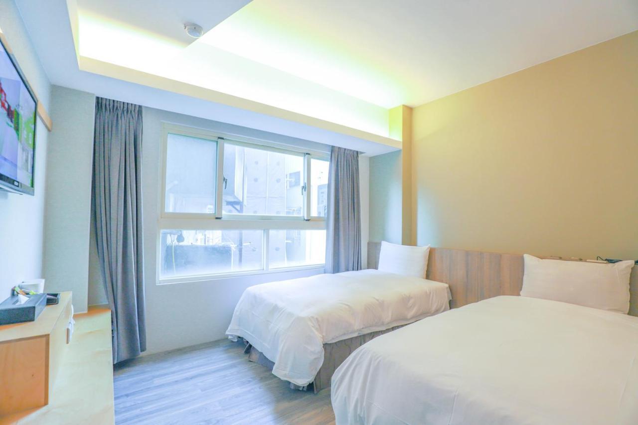 Talmud Business Hotel - Zhongshan ไถจง ภายนอก รูปภาพ