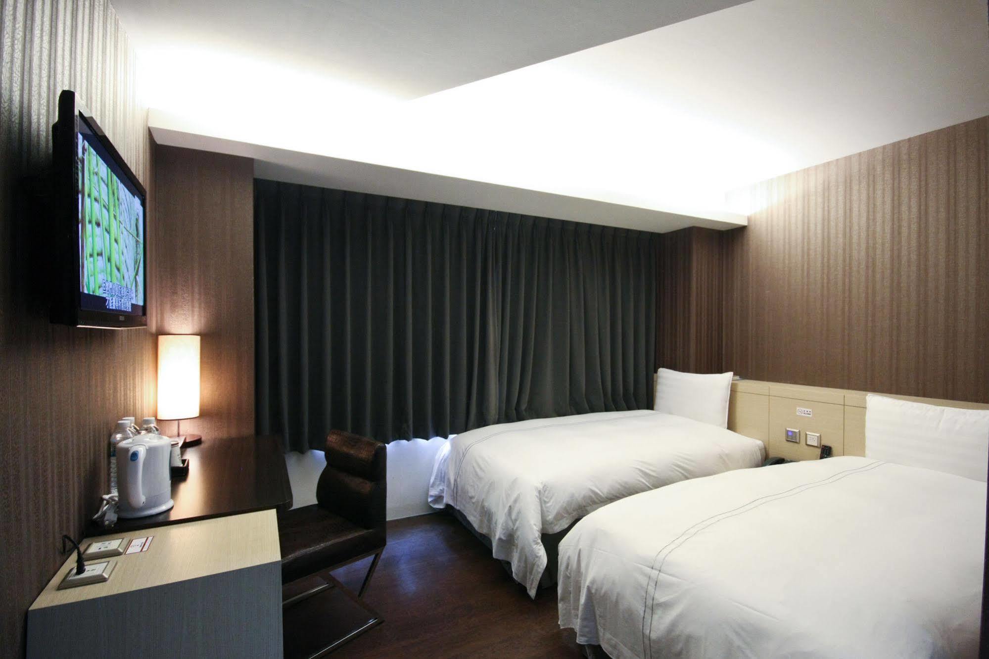 Talmud Business Hotel - Zhongshan ไถจง ภายนอก รูปภาพ