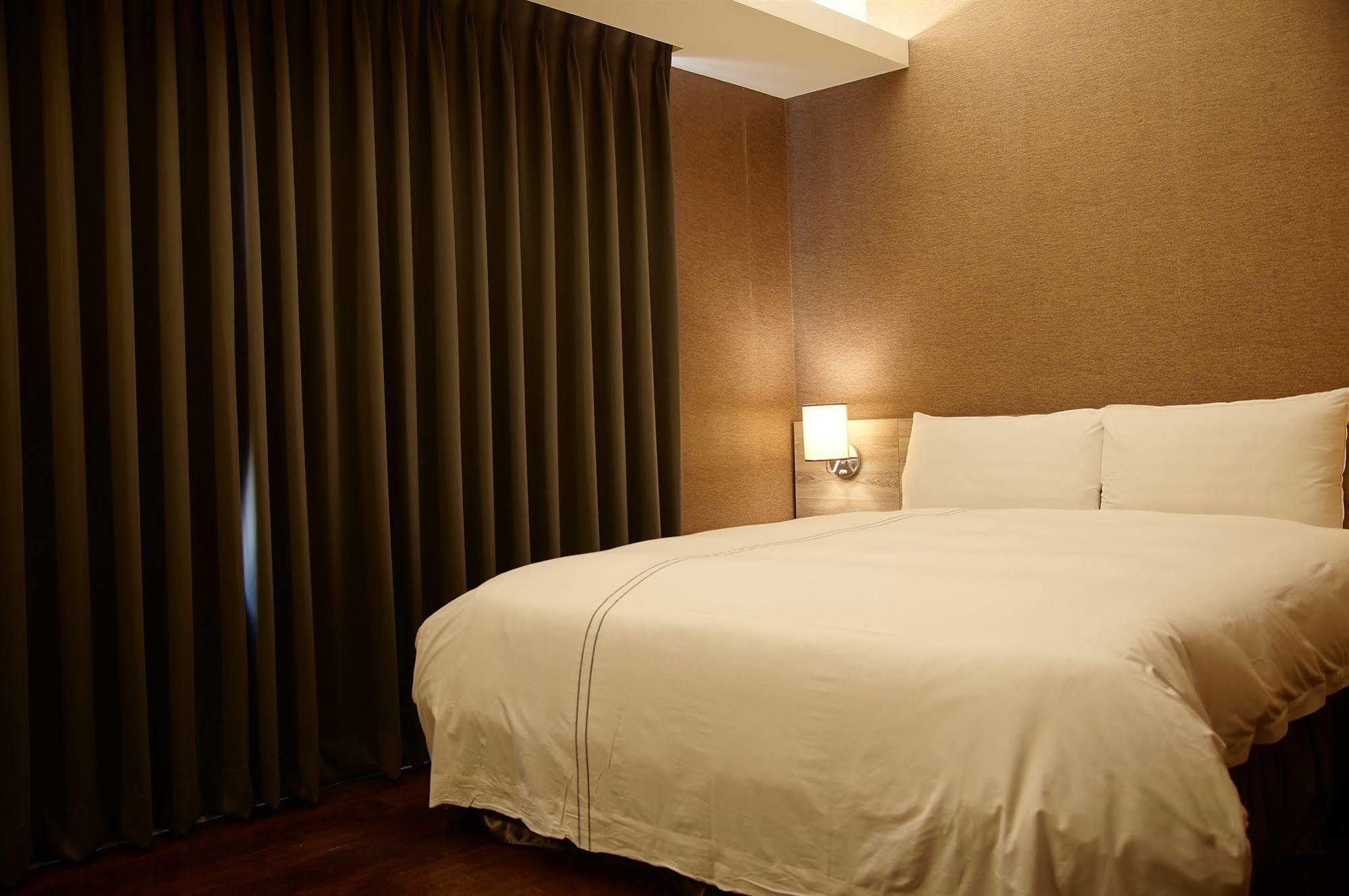 Talmud Business Hotel - Zhongshan ไถจง ภายนอก รูปภาพ
