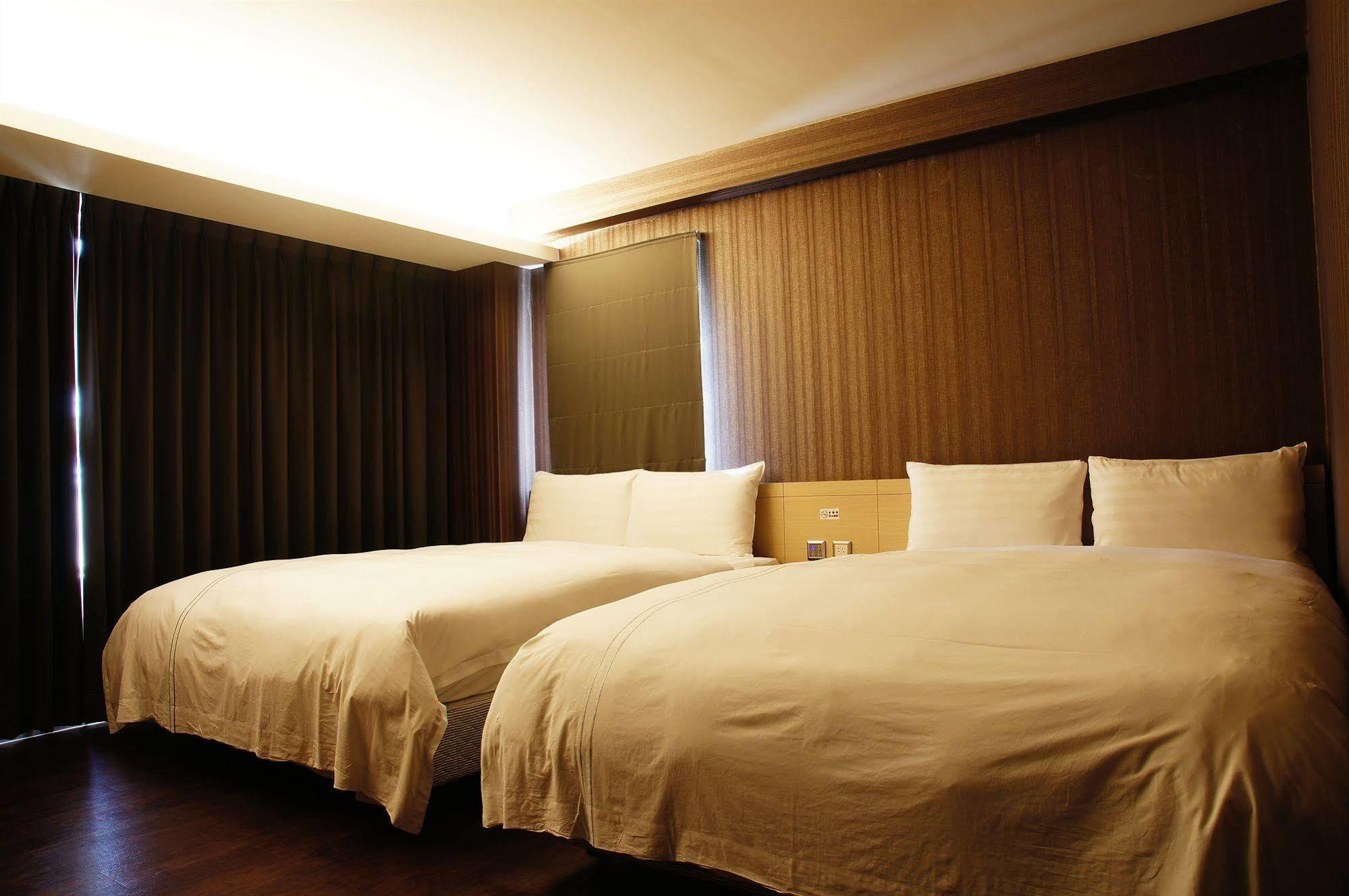 Talmud Business Hotel - Zhongshan ไถจง ภายนอก รูปภาพ